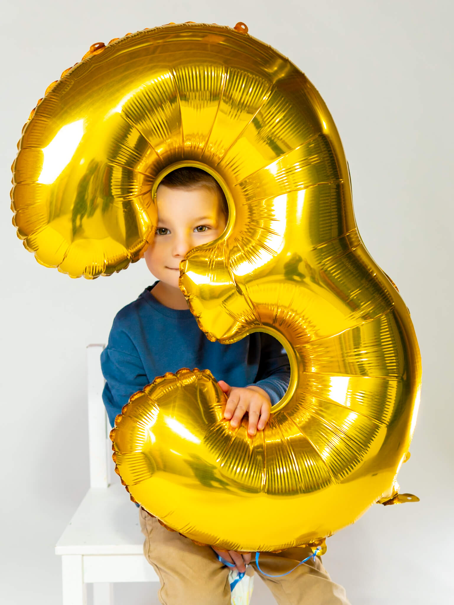 Studio birthday photo of boy by Greasypixel photography in Kitchener