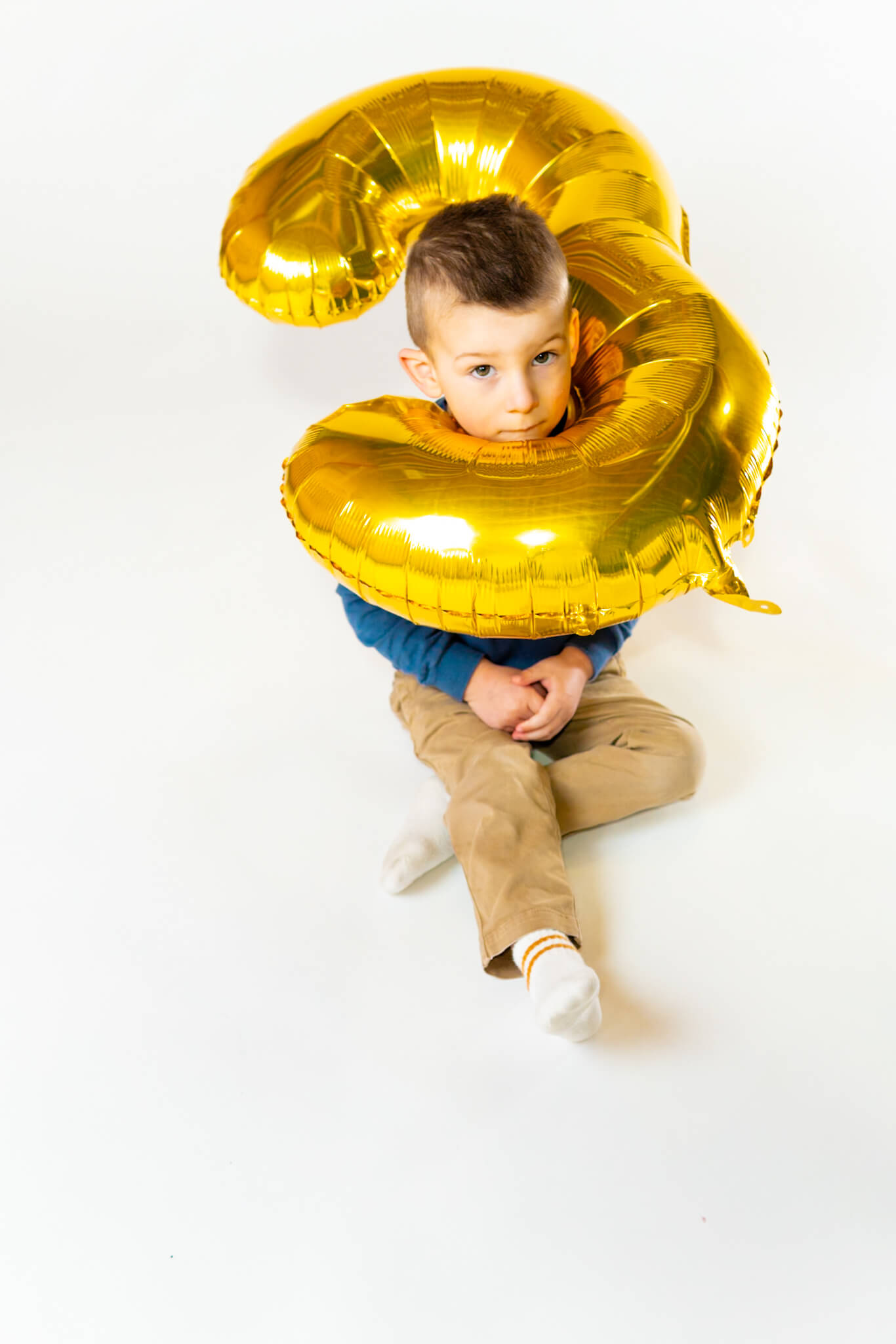 Fun studio birthday photo of boy in Kitchener