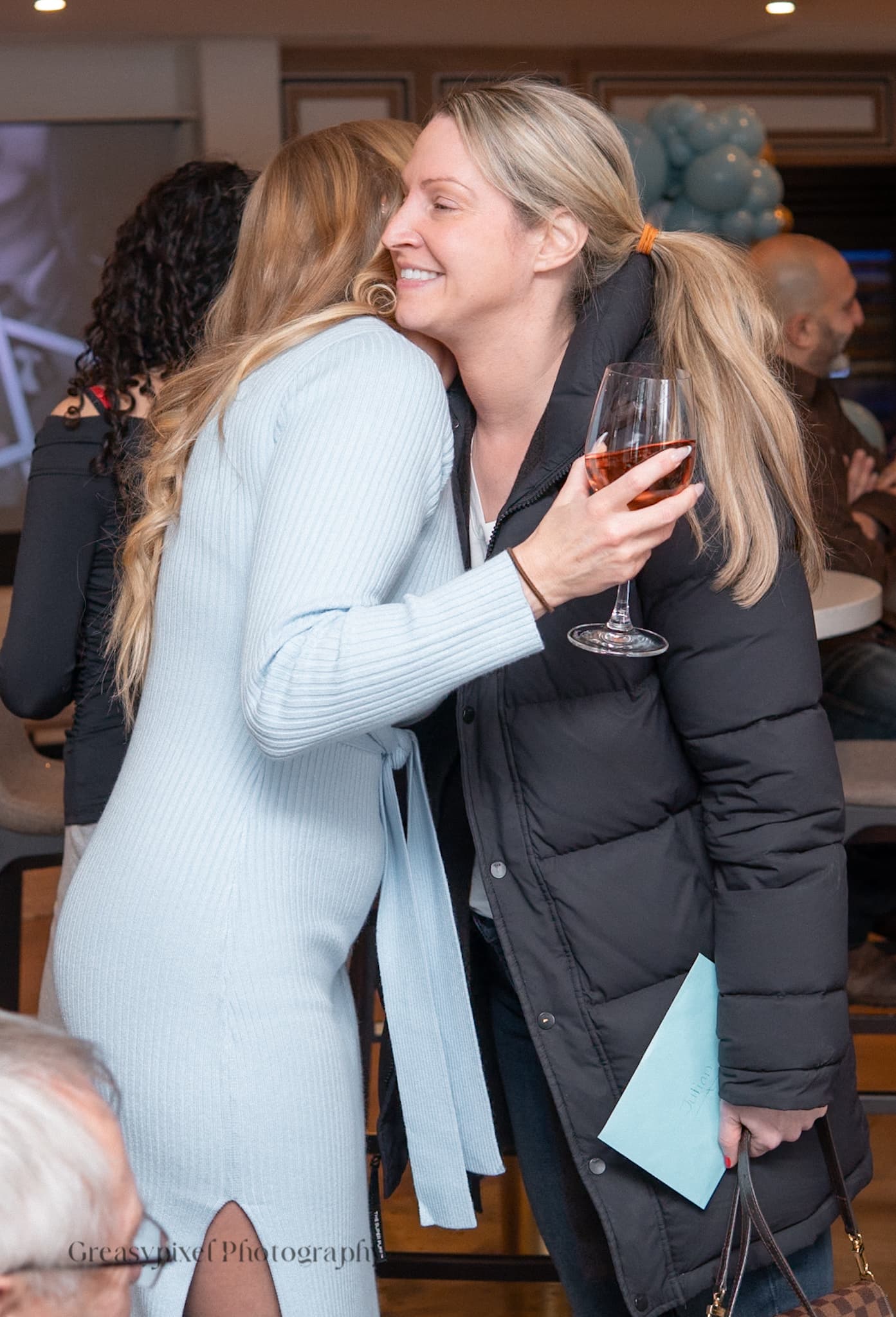 Birthday event photographer Cambridge - father-daughter embrace