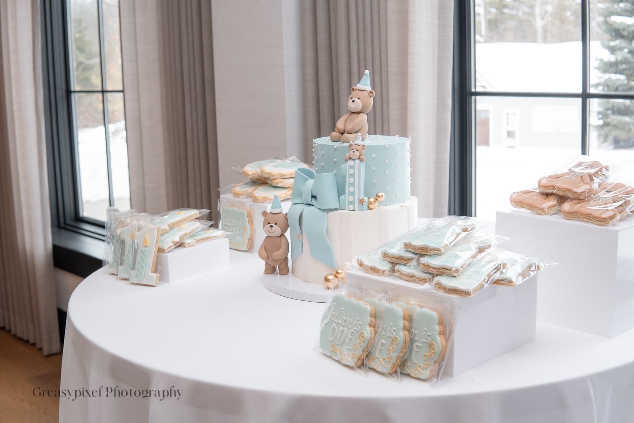 First birthday party photography by Greasypixel - elegant cake table setup