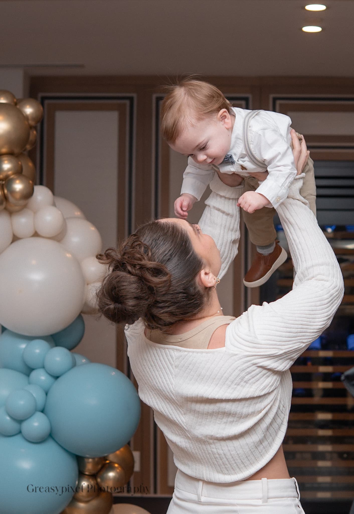 Event photography Waterloo Kitchener - joyful mother and baby